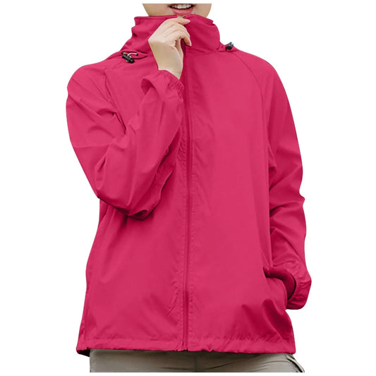 Person wearing a bright pink jacket on a white background