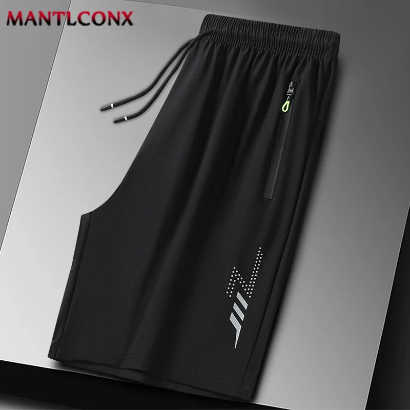 Black shorts with a brand logo on a gray background
