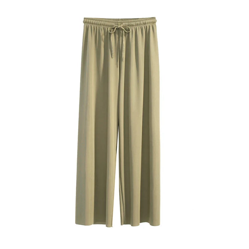 Beige pants with drawstring on a white background