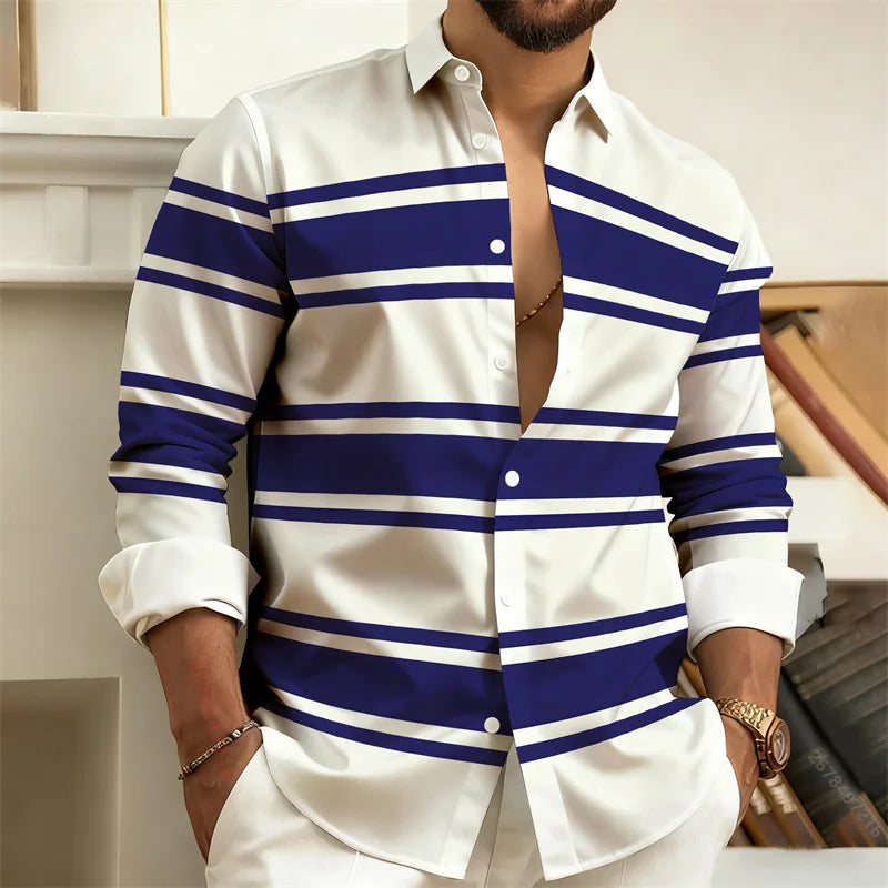 Man wearing a white shirt with blue horizontal stripes, sitting on a couch.