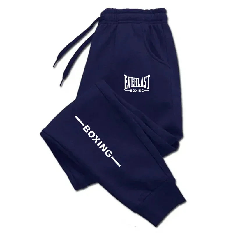 Navy blue sweatpants with 'Everlast Boxing' logo on a white background