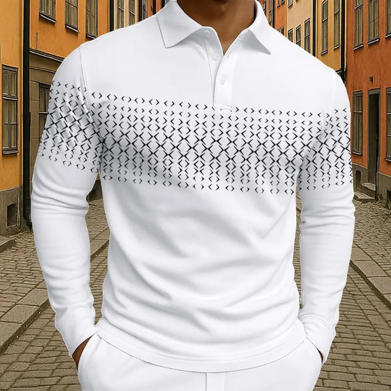 White long-sleeve shirt with geometric pattern worn by a person on a street.