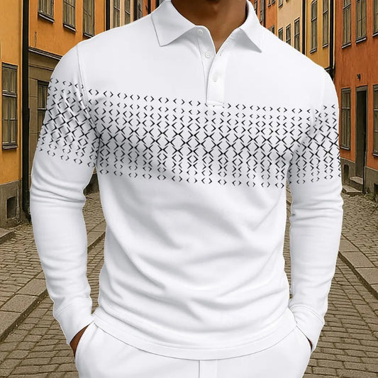 White long-sleeve shirt with geometric pattern worn by a person on a street.