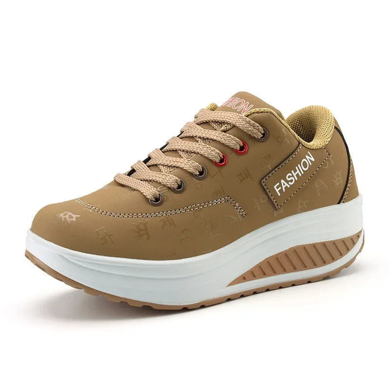 Brown sneaker with white sole on a white background
