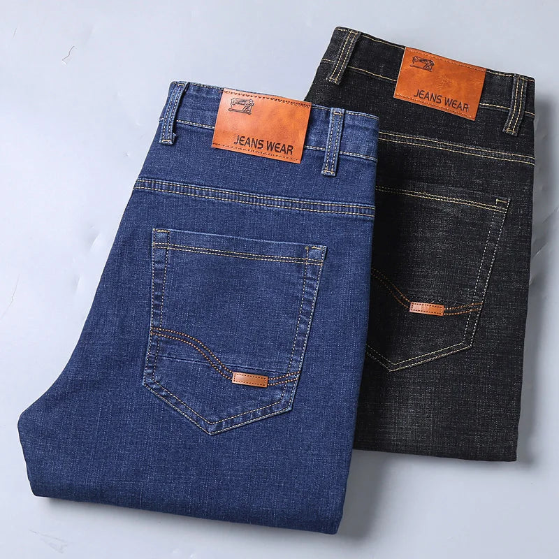 Two pairs of jeans, one blue and one black, with 'Jeans Wear' labels on a light gray background.