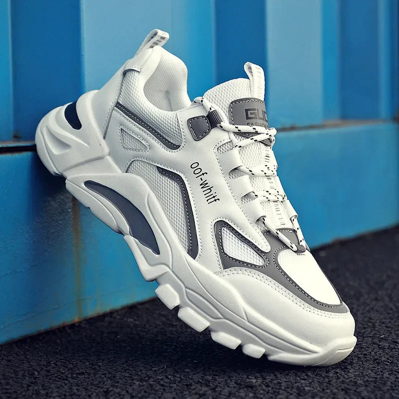 White and gray sneaker with 'ootwhiff' branding against a blue background