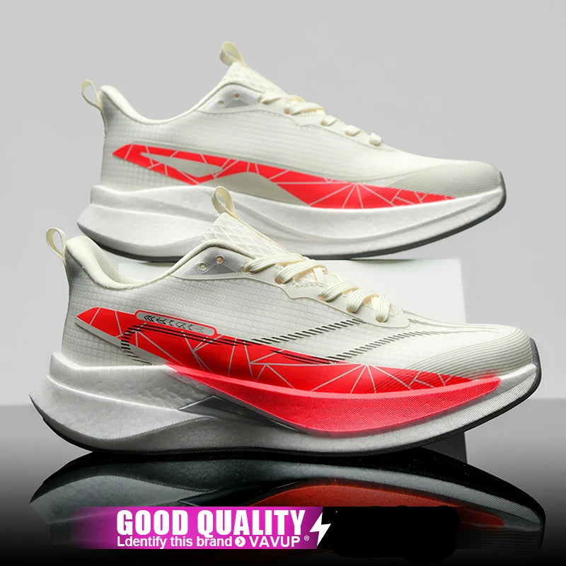 White and red athletic shoes with a gray background