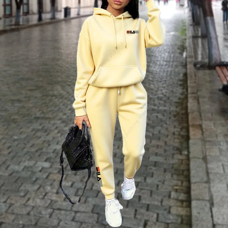 Person wearing a yellow tracksuit with a blurred background