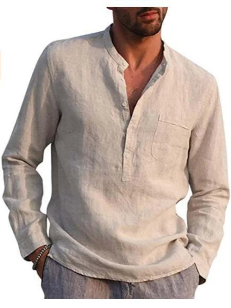 Man wearing a light beige long-sleeve shirt with a pocket on a white background
