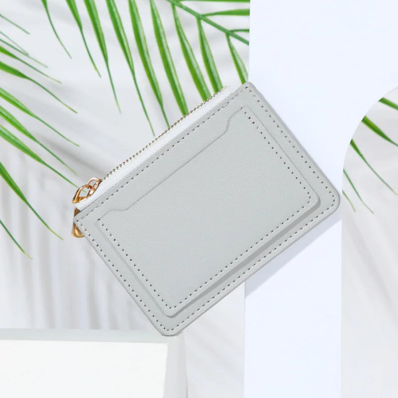 Women's PU leather mini wallet with zipper, hasp, and multi-card slots  - white