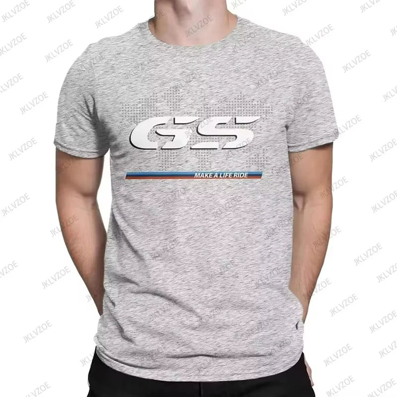 Person wearing a gray t-shirt with 'GS' logo and text on a white background