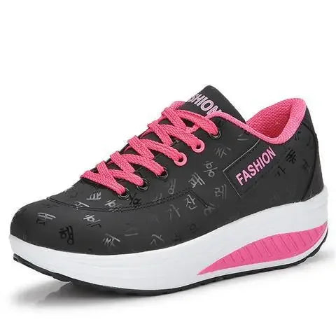 Black and pink sneaker with 'Fashion' text on a white background
