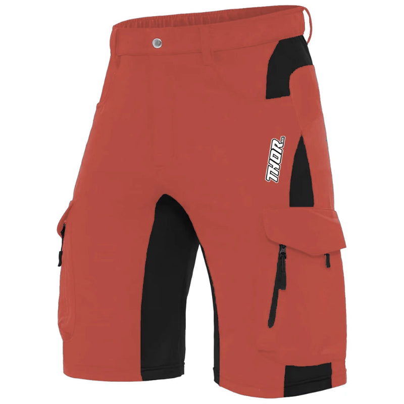Red and black shorts with a visible brand logo on a white background