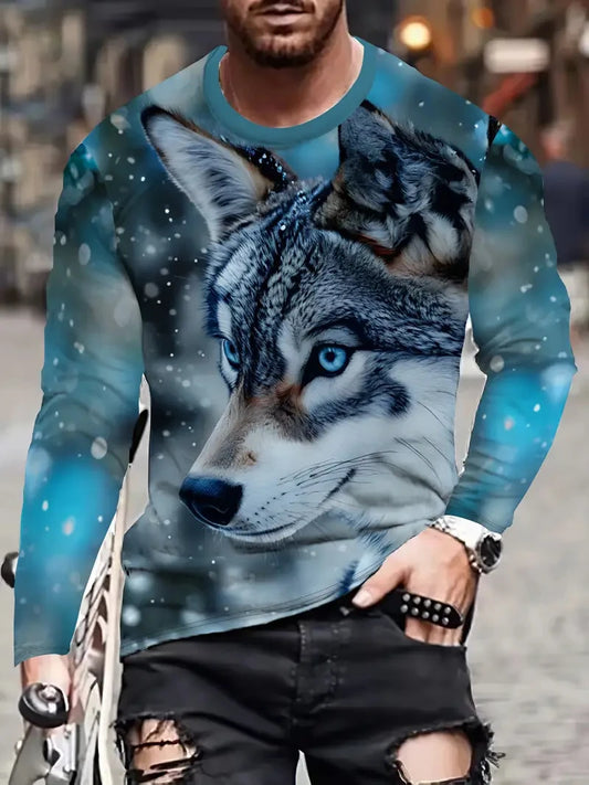 Person wearing a long-sleeve shirt with a wolf design in a snowy landscape.