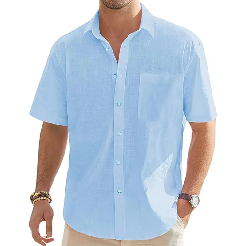 Man wearing a light blue short-sleeve shirt on a white background