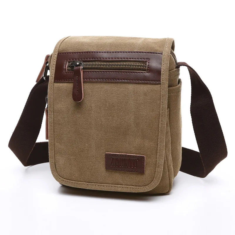 Brown canvas crossbody bag with a visible brand logo on a white background