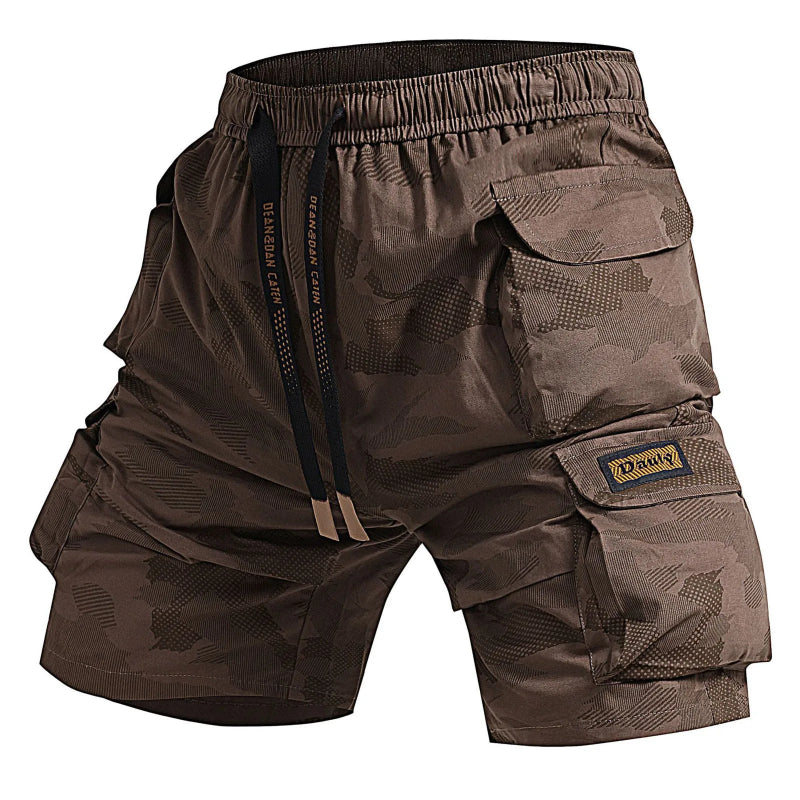 Brown camouflage cargo shorts on a white background