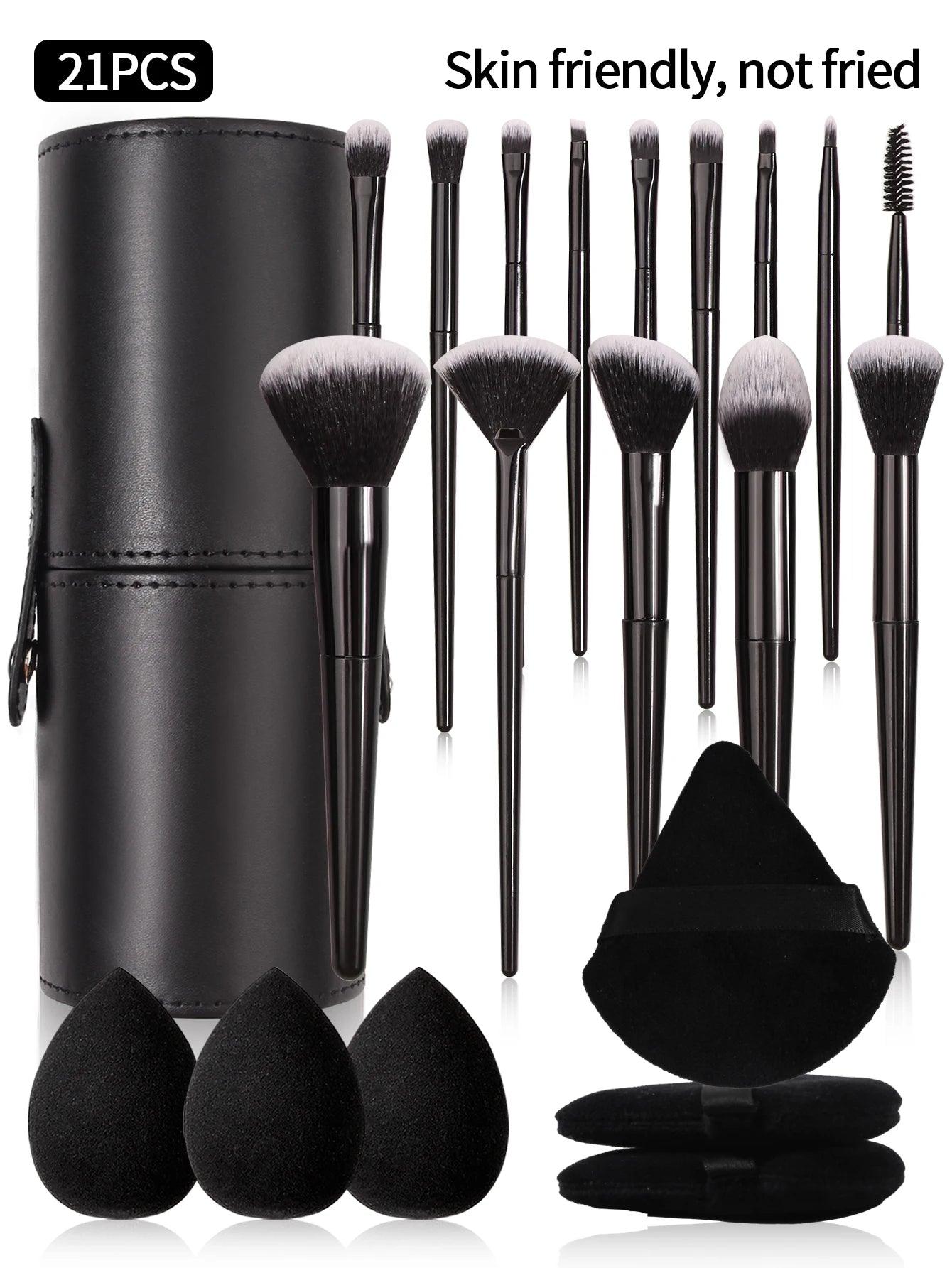 Set of 21 makeup brushes with black holder and black sponges on a white background
