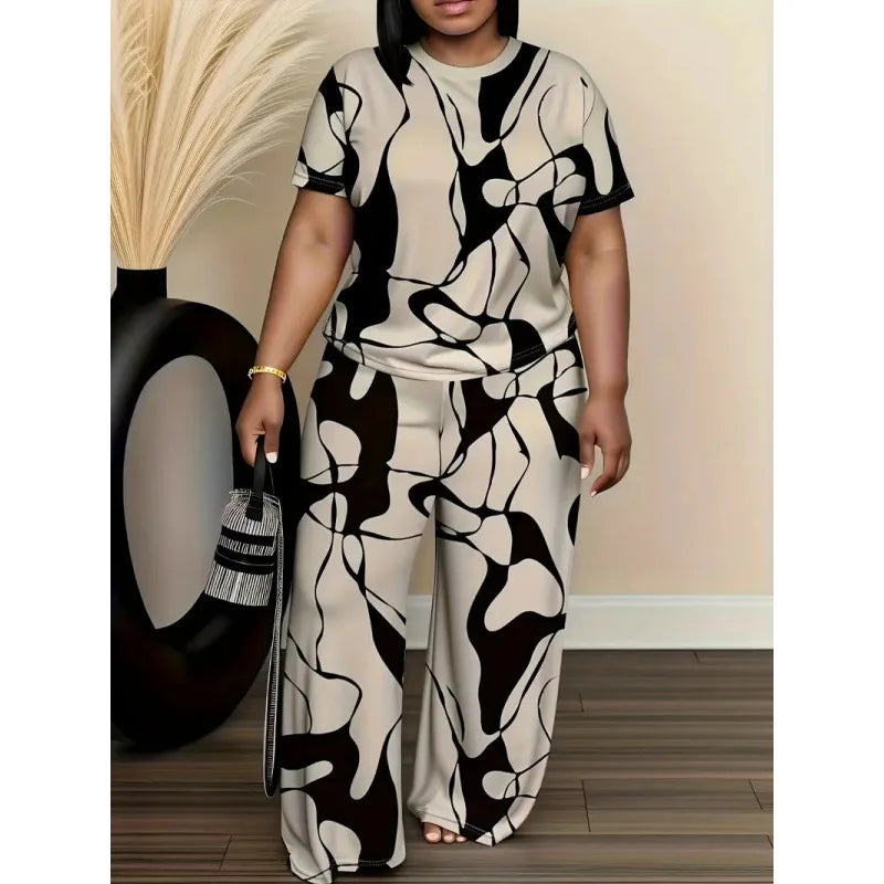 Woman wearing a black and white abstract patterned outfit with a decorative background.