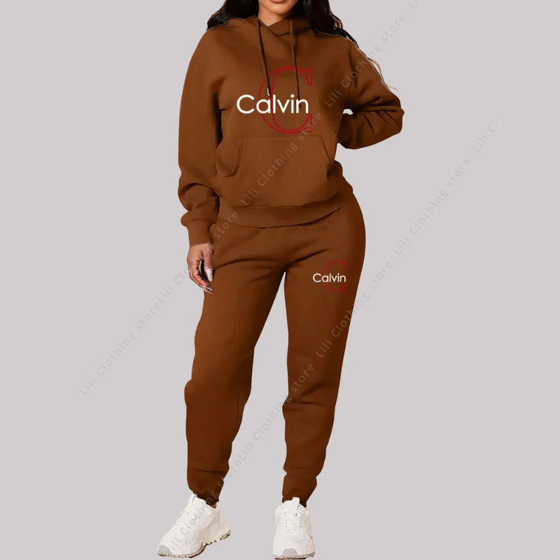 Brown Calvin  tracksuit worn by a person on a gray background