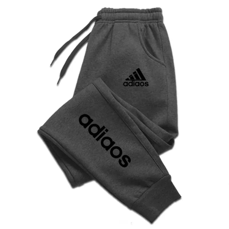 Gray Adidas tracksuit on a white background
