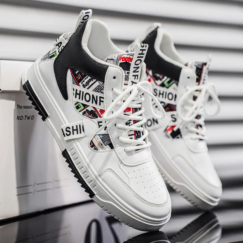 White sneakers with black and colorful text design on a reflective surface.
