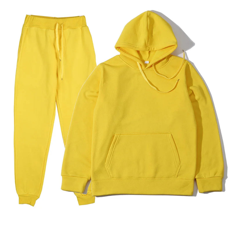 Yellow hoodie and pants set on a white background