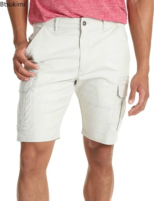 White cargo shorts worn by a person on a plain background