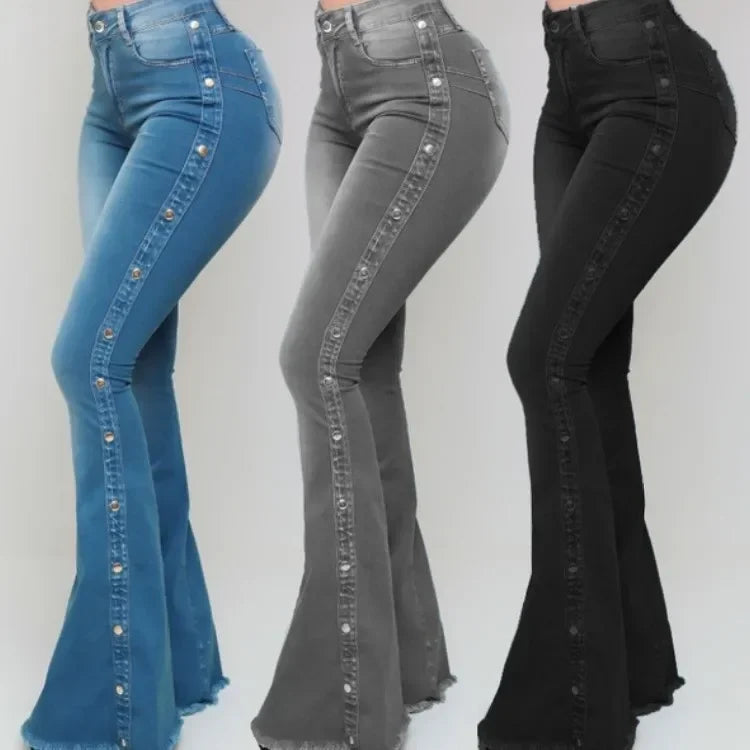 Three pairs of flared jeans in blue, gray, and black on a white background