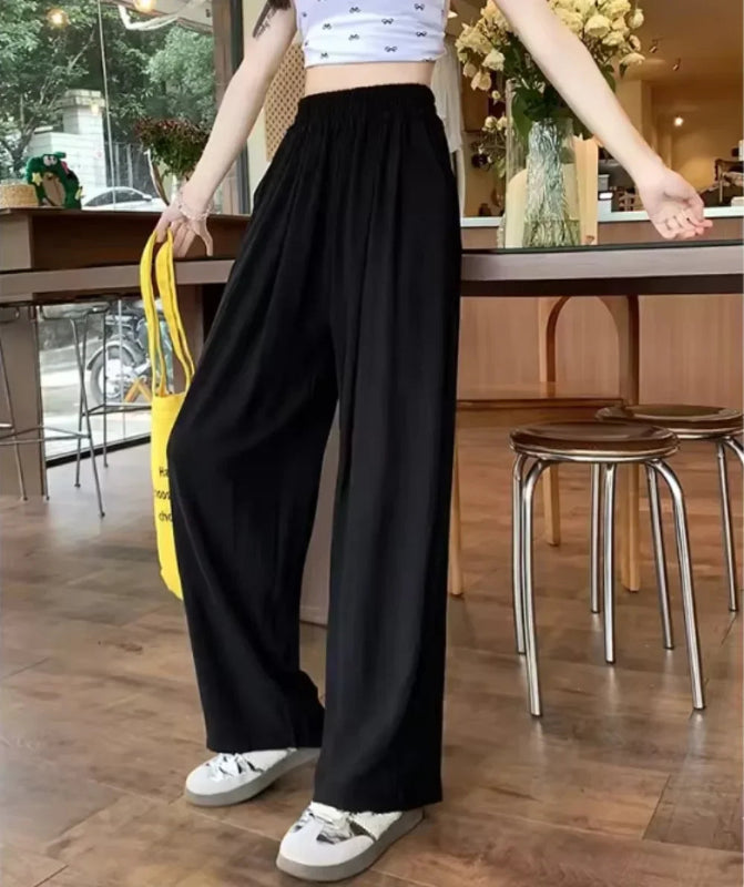 Women’s ankle‑length ice silk wide‑leg pants with elastic waist in solid color black 