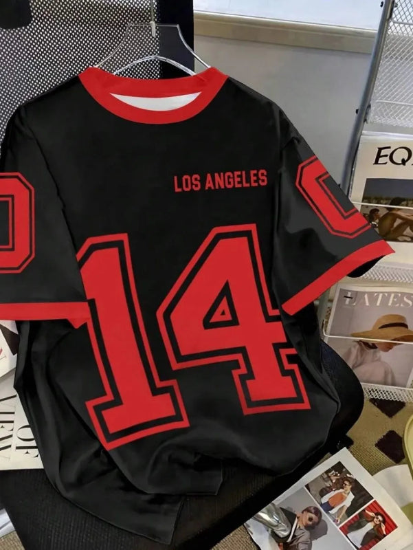 Black jersey with red text and numbers on a magazine background