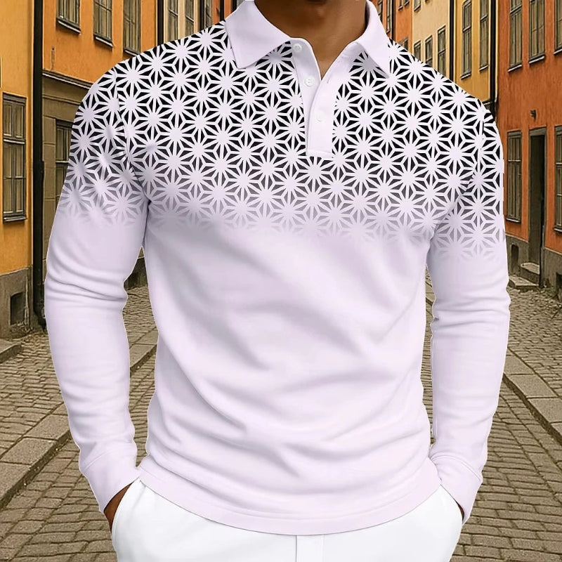 White long-sleeve shirt with geometric pattern worn by a person on a street.