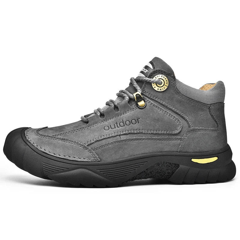 Gray outdoor shoe with gold accents on a white background
