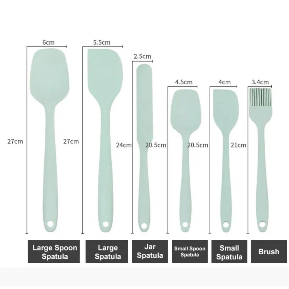 Set of kitchen spatulas with measurements on a white background