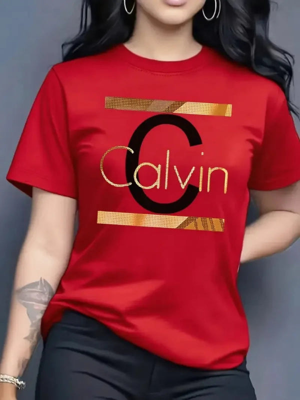 Person wearing a red Calvin Klein t-shirt with a gray background