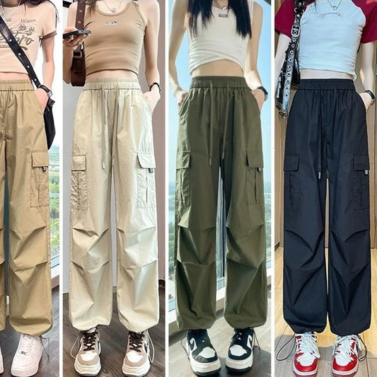 Four different styles of wide-leg cargo pants worn by models outdoors.