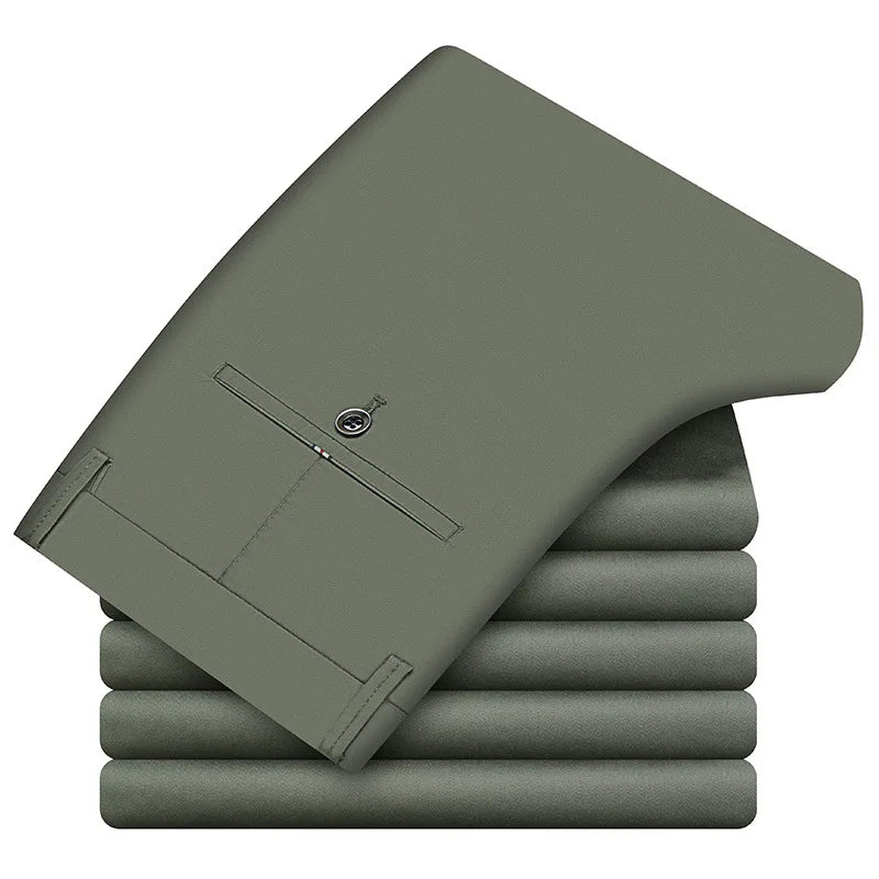 Stack of green pants on a white background