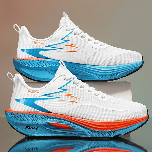White running shoes with blue and orange accents on a reflective surface.