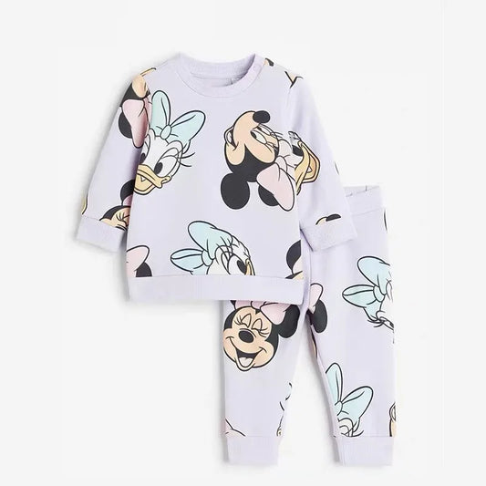 Children's pajama set with cartoon character design on a white background
