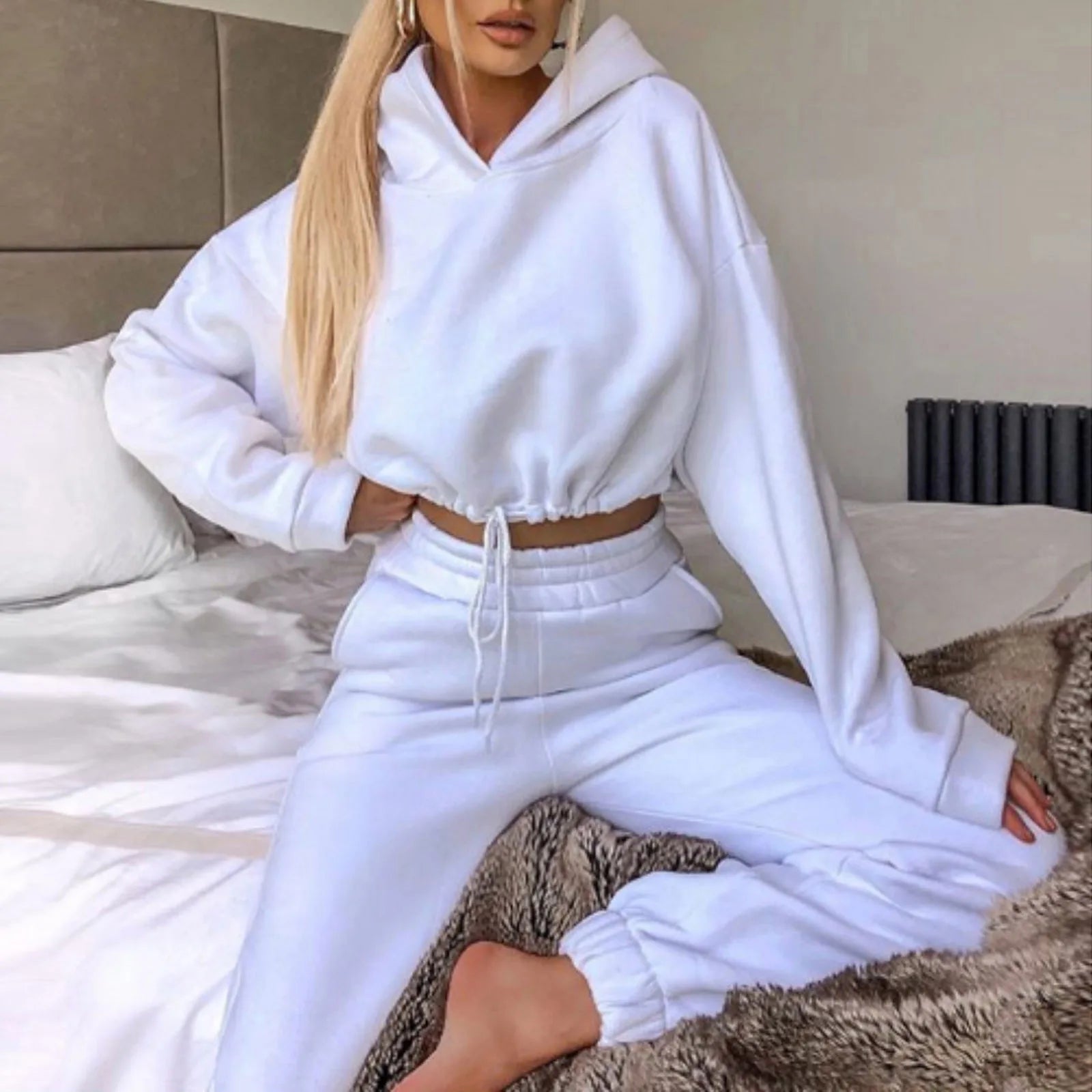 Women’s fashion two-piece sportswear set with long sleeves and high-waist casual pants in neutral tones white