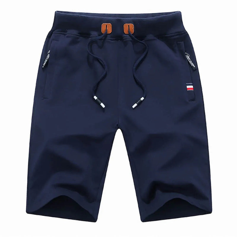 Navy blue shorts with drawstring on a white background