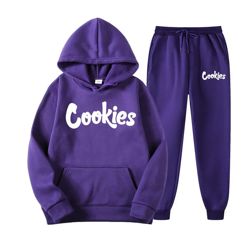 Purple 'Cookies' hoodie and sweatpants set on a white background