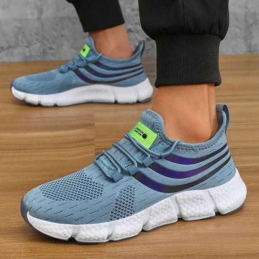 Blue athletic shoes with white soles on a wooden floor