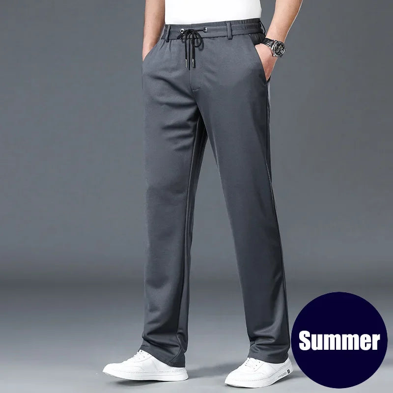 Gray pants worn by a person on a gray background with 'Summer' label.