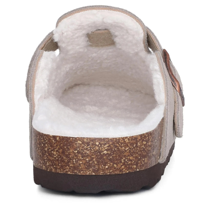 Brown clog shoe with white fur lining on a white background