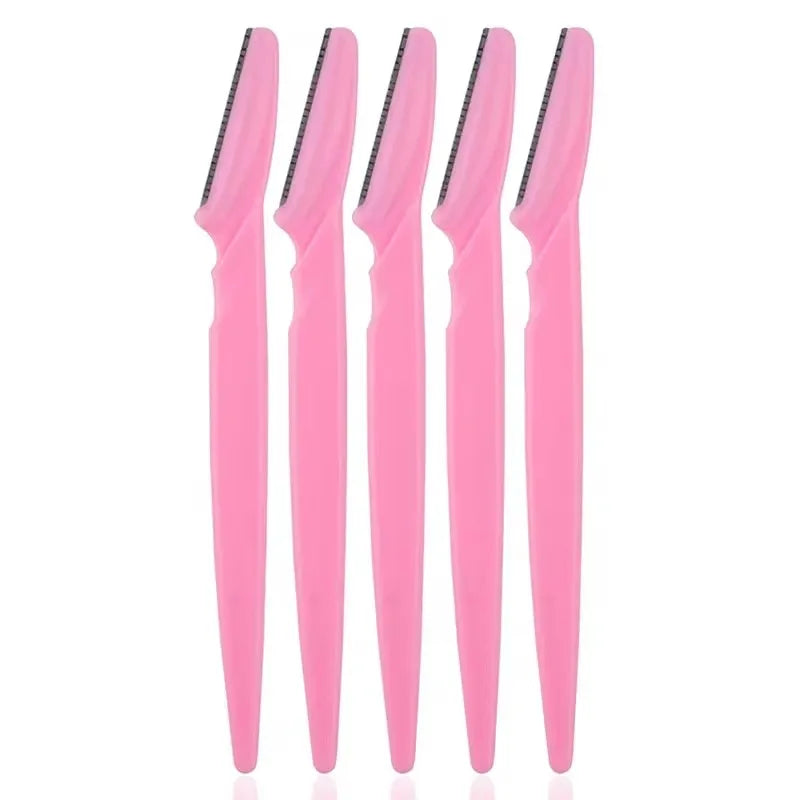 Four pink eyebrow razors with black blades on a white background
