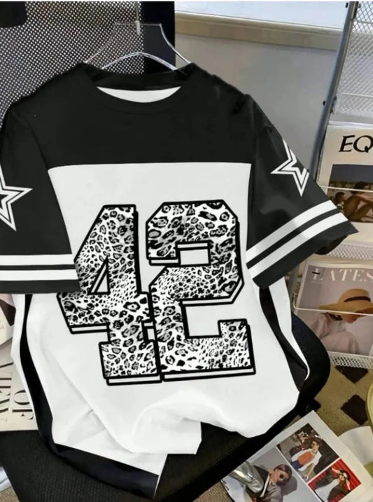 Black and white sweatshirt with leopard print number 42 on a magazine background