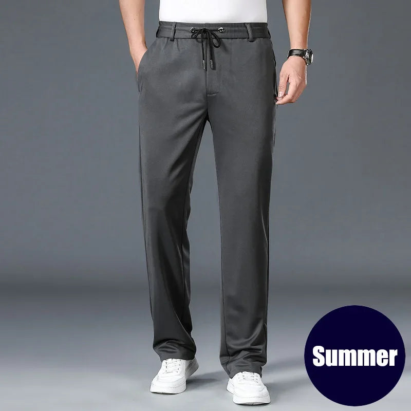 Gray pants worn by a person on a gray background with 'Summer' label.