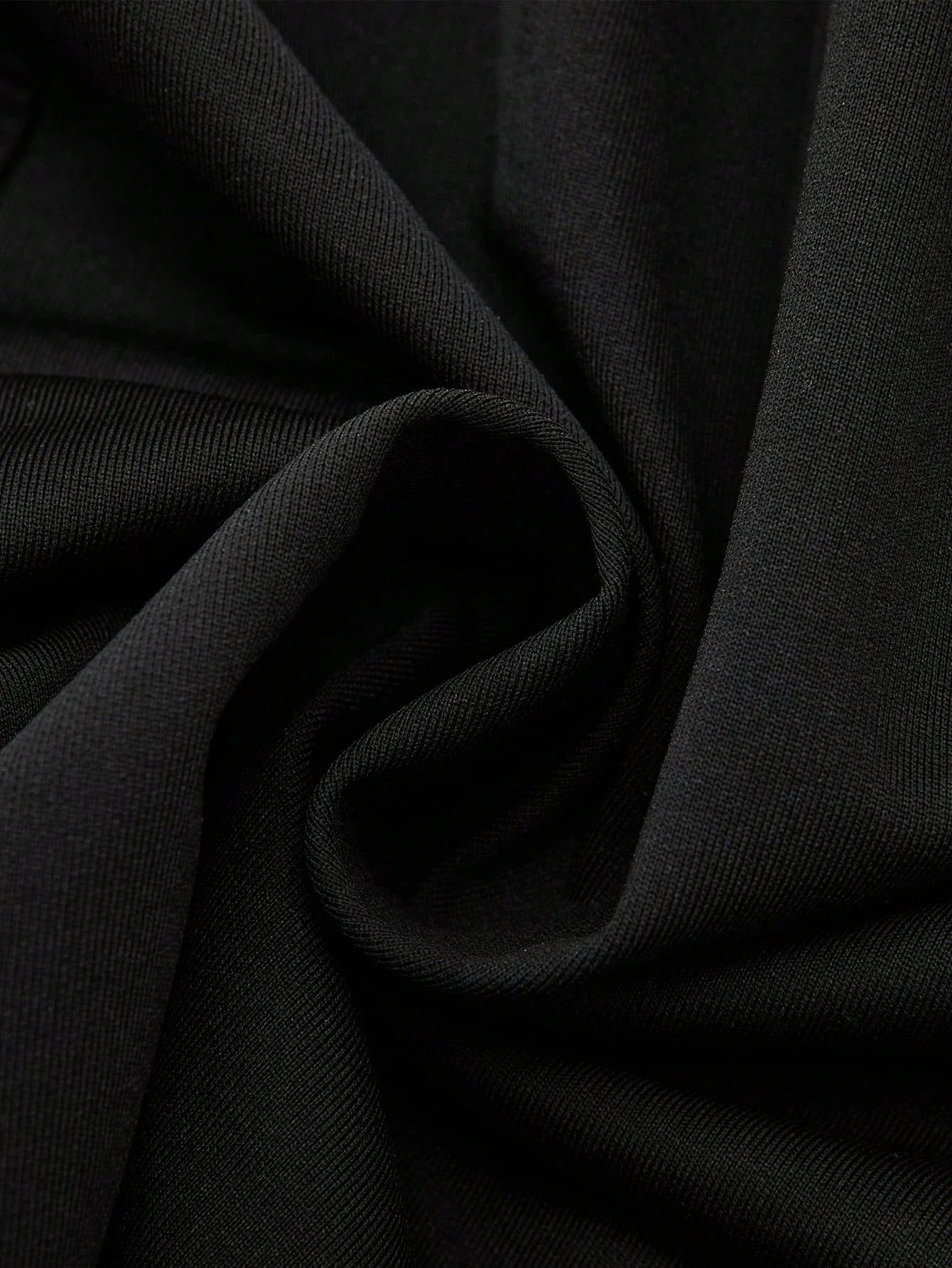 Close-up of black fabric with folds