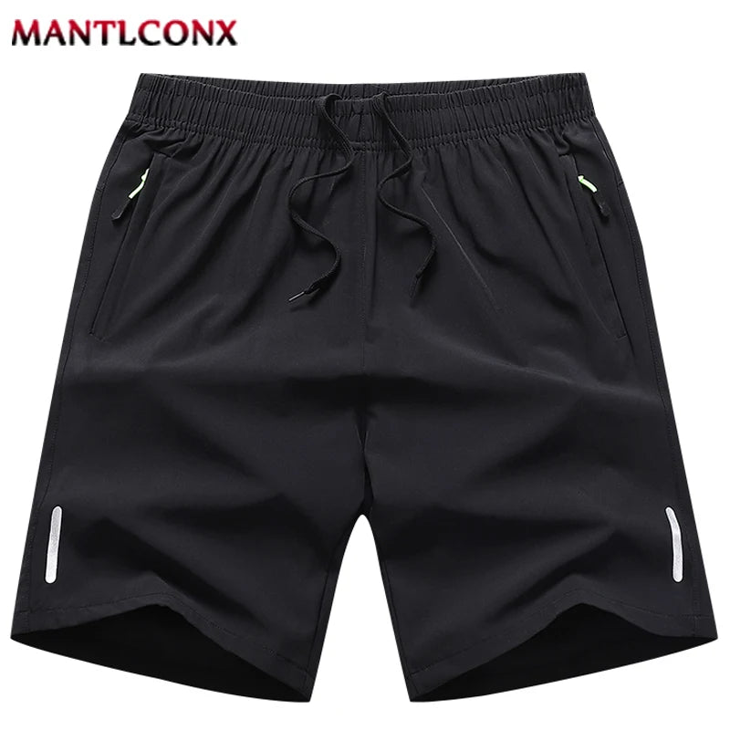 Black shorts with drawstring on a white background, branded 'MANTLCONX'.